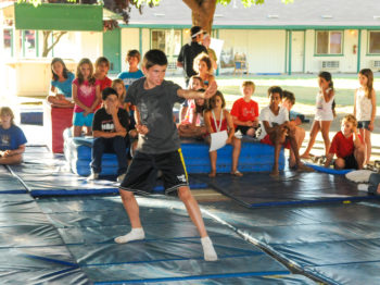 A camper learning how to do martial arts.