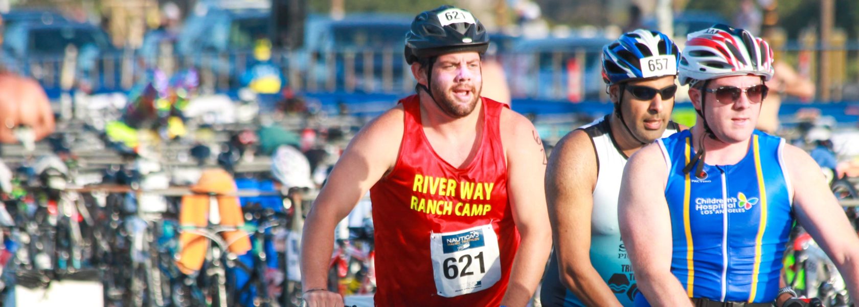 A river way ranch camp staff member participating in a triathlon.