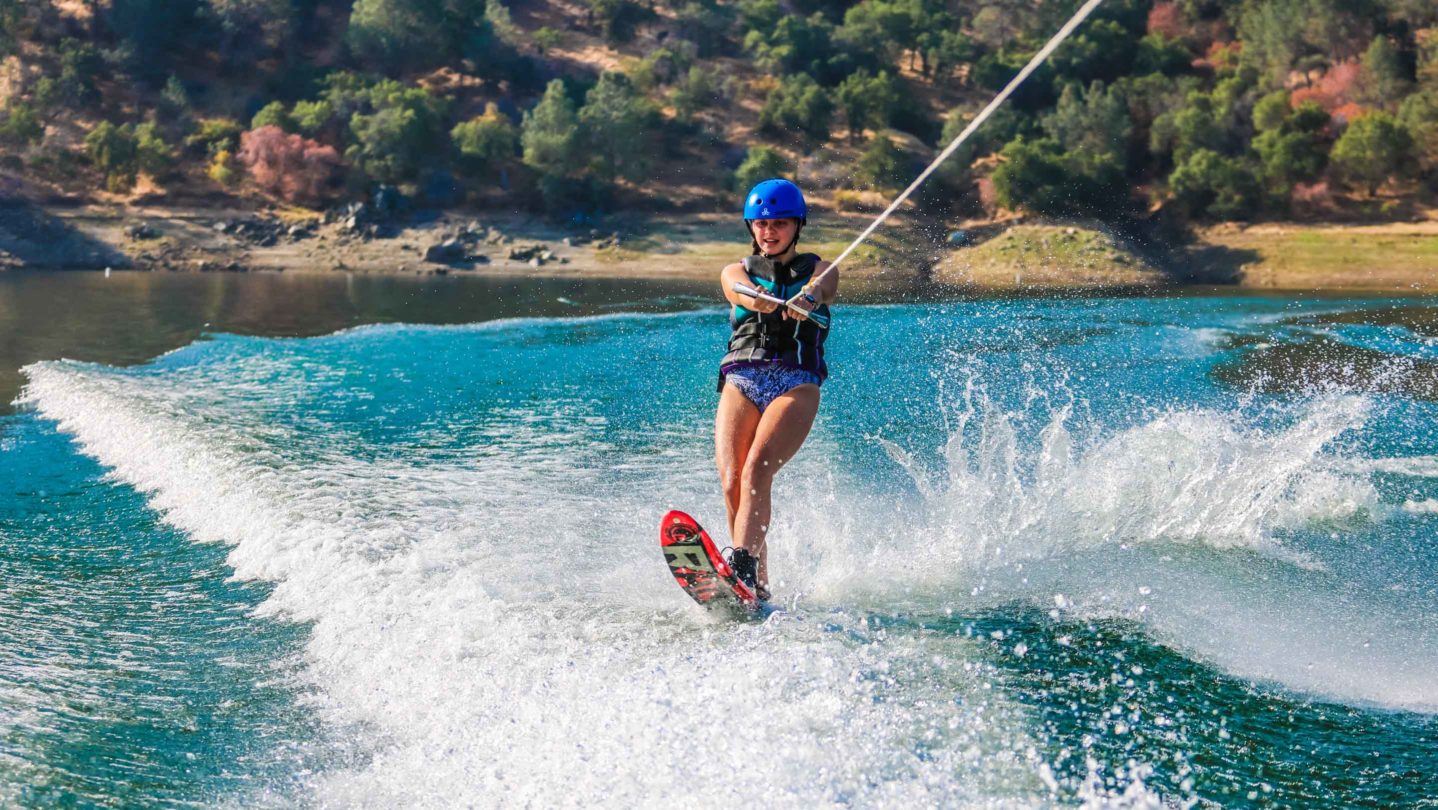 A camper learning how to waterski